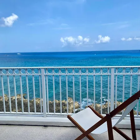New Oceanfront Condo In George Town